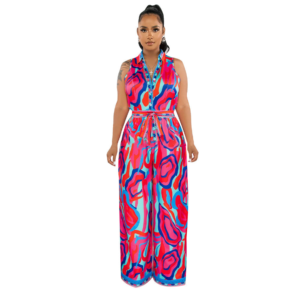 Quella | Vrouwen Wijd Been Abstracte Afdruk Jumpsuit met Strik Stropdas