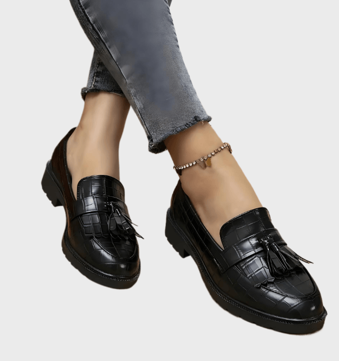 Jayda Zwarte loafers met kwastjes en patroonontwerp